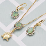Oro Laminado Earring and Pendant Adult Set, Gold Filled Style Turtle Design, with Chrysolite Opal and White Crystal, Polished, Golden Finish