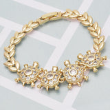 Oro Laminado Fancy Bracelet, Gold Filled Style Turtle and Leaf Design, with White Cubic Zirconia, Polished, Golden Finish