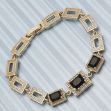 Oro Laminado Fancy Bracelet, Gold Filled Style with Black and White Cubic Zirconia, Polished, Golden Finish