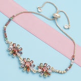 Oro Laminado Adjustable Bolo Bracelet, Gold Filled Style Flower and Baguette Design, with Multicolor Cubic Zirconia, Polished, Golden Finish