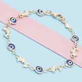 Oro Laminado Fancy Bracelet, Gold Filled Style Evil Eye and Dolphin Design, Blue Resin Finish, Golden Finish