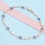 Oro Laminado Fancy Anklet, Gold Filled Style Evil Eye and Dolphin Design, Blue Resin Finish, Golden Finish