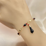 Oro Laminado Charm Bracelet, Gold Filled Style Polished, Golden Finish
