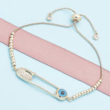 Oro Laminado Adjustable Bolo Bracelet, Gold Filled Style Evil Eye and Paperclip Design, with White Micro Pave, Polished, Golden Finish