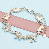 Oro Laminado Fancy Bracelet, Gold Filled Style Elephant Design, with White and Black Crystal, Polished, Golden Finish