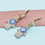 Oro Laminado Dangle Earring, Gold Filled Style Hand of God Design, with White Crystal, Blue Enamel Finish, Golden Finish