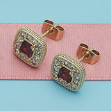 Oro Laminado Stud Earring, Gold Filled Style with Garnet Cubic Zirconia and White Micro Pave, Polished, Golden Finish