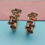 Oro Laminado Huggie Hoop, Gold Filled Style Baguette Design, with Garnet Cubic Zirconia, Polished, Golden Finish