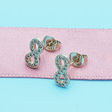 Oro Laminado Stud Earring, Gold Filled Style Infinite Design, with White Micro Pave, Polished, Golden Finish