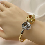 Oro Laminado Individual Bangle, Gold Filled Style Love Knot Design, Diamond Cutting Finish, Two Tone