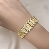 Oro Laminado Solid Bracelet, Gold Filled Style Flower Design, Diamond Cutting Finish, Golden Finish
